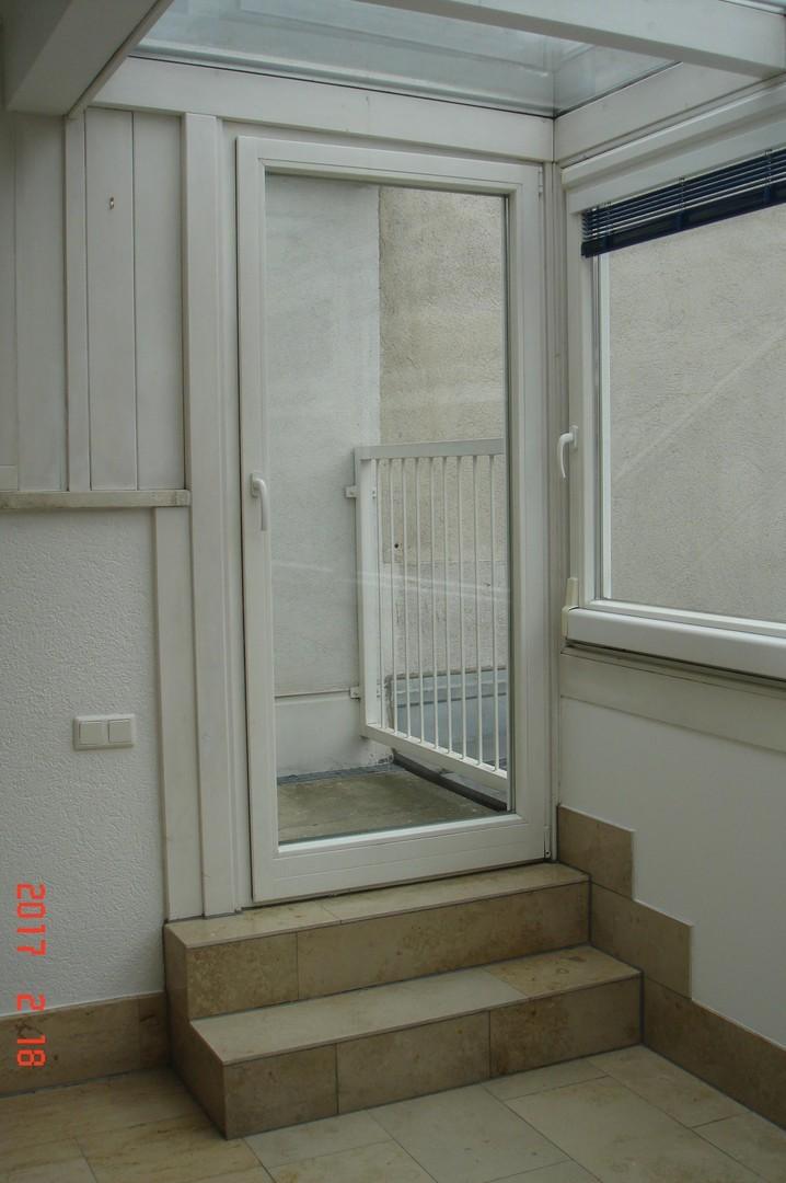 Wintergarten mit Ausgang zur T