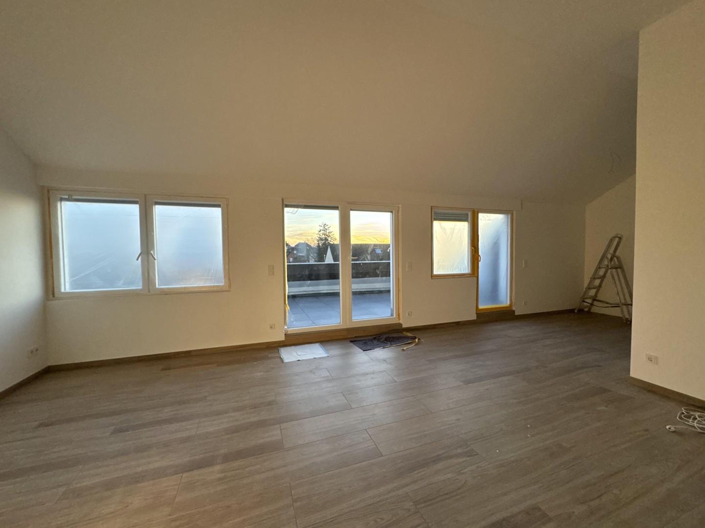 Wohnzimmer mit Wohnküche
