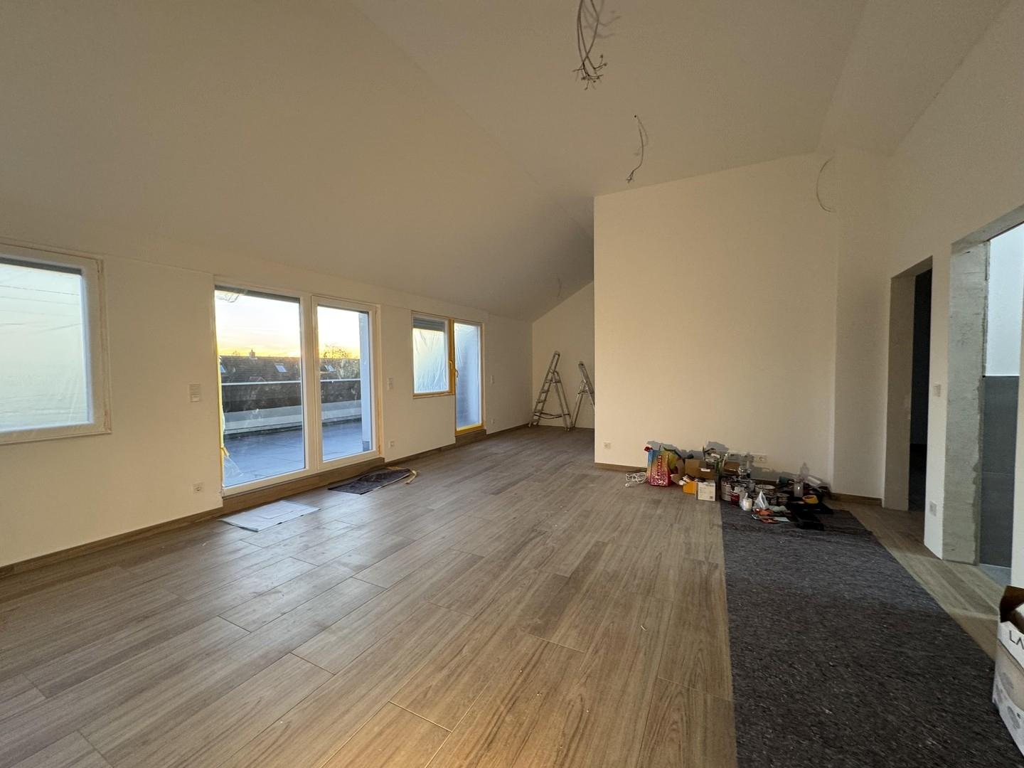 Wohnzimmer mit Wohnküche