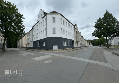 A_photograph_captures_a_daytime_street_scene_at_th