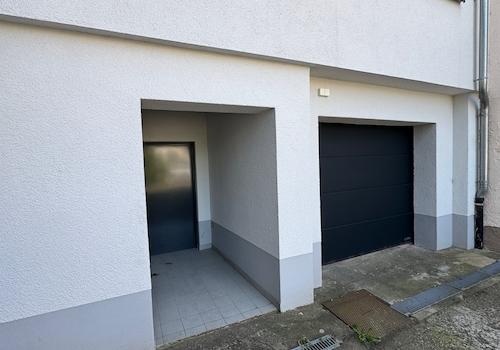 Garage + Stellplätze