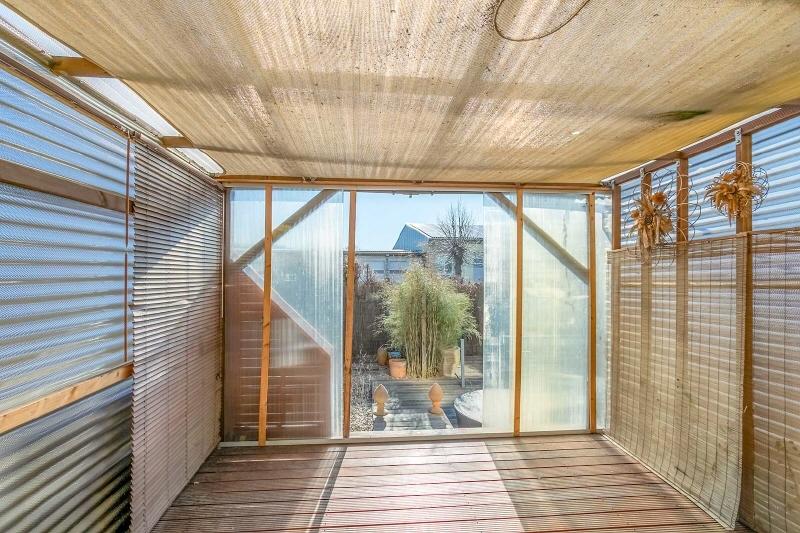 Wintergarten mit Gartenzugang