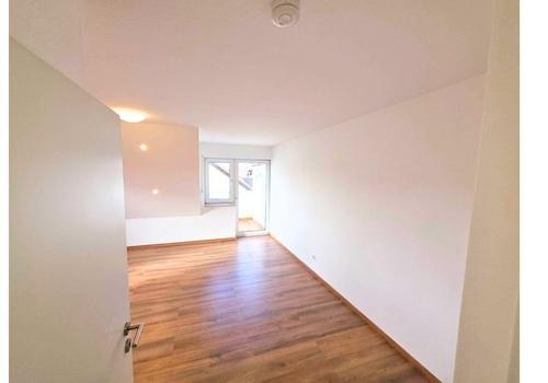 1.OG - Wohnzimmer mit Balkon