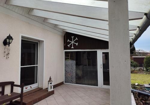 Terasse mit Wintergarten