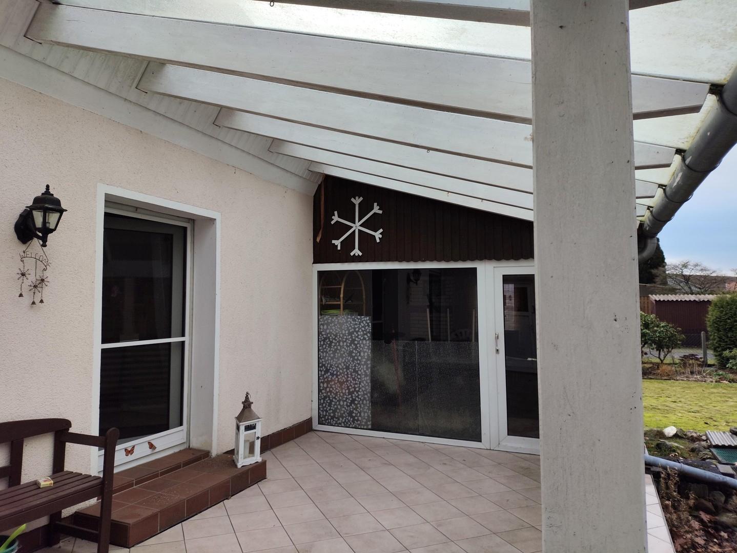 Terasse mit Wintergarten