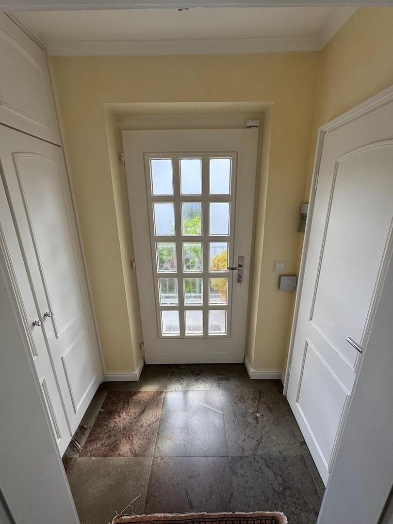 Einganstür, Windfang