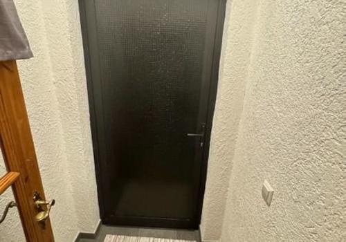 110 Garderobe und Außeneingang