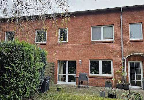 Wohnungseingang mit Terrasse