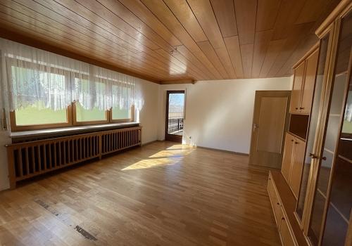 Wohnzimmer im EG mit Balkon