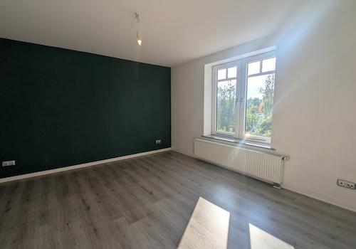 Wohnzimmer in Wohnung 3 im DG