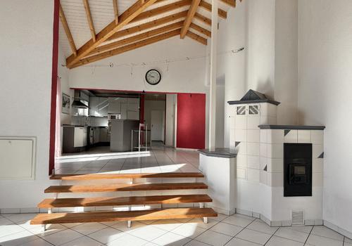 Wohn-/Essbereich mit Ofen Obergeschosswohnung