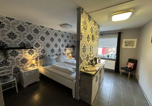 Schlafzimmer II im EG