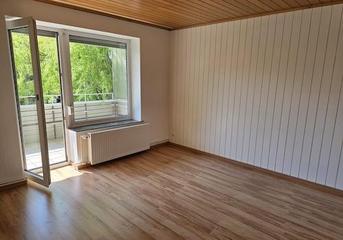 Schlafzimmer mit Balkonzugang