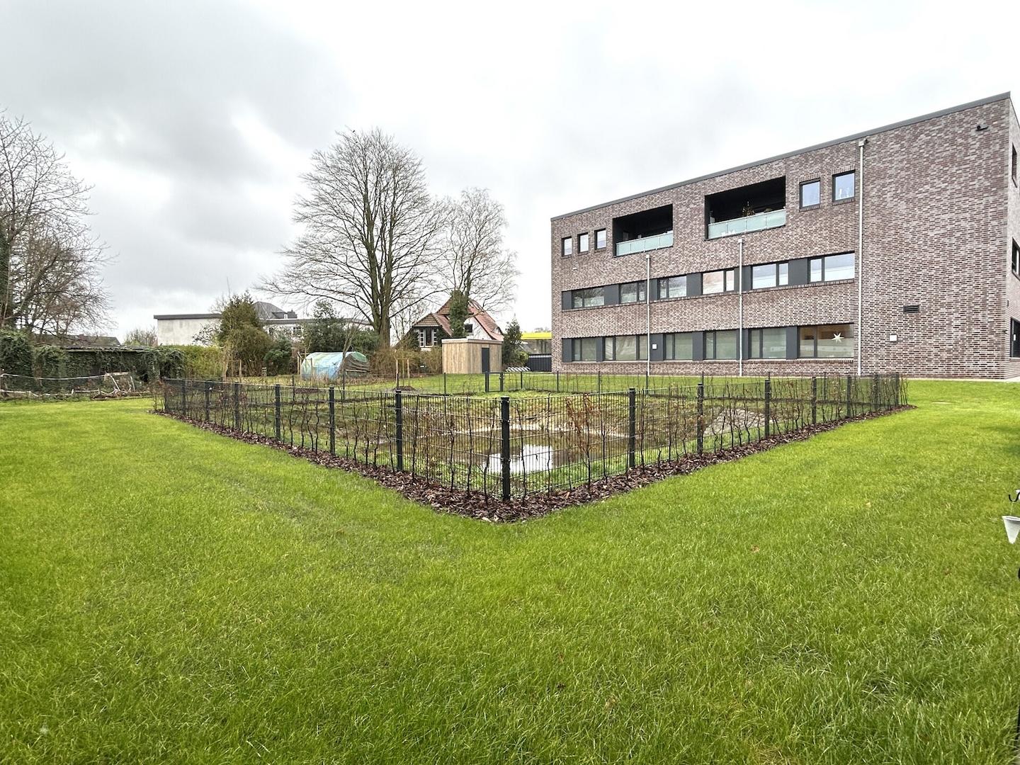 Gemeinschaftsgarten mit Regenrückhaltebecken