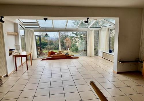 Wohnzimmer mit Wintergarten