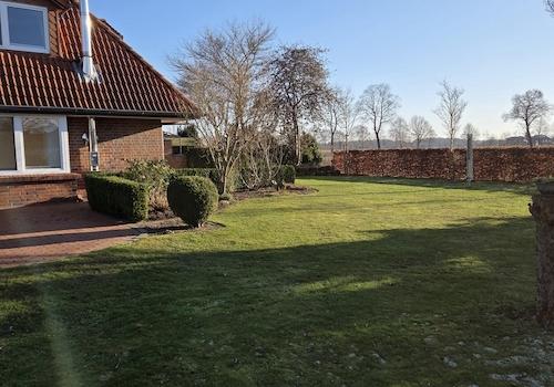 Garten mit Buchenhecke