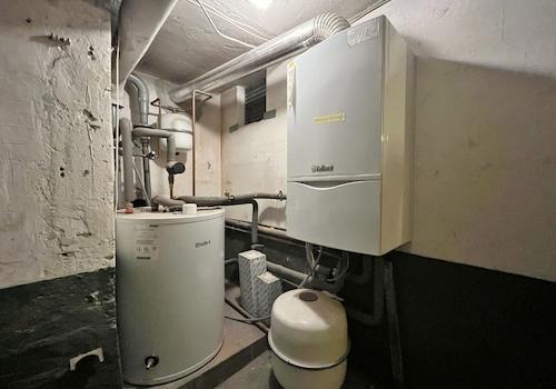 Gasheizung mit Warmwasserspeicher für EG-Wohnung