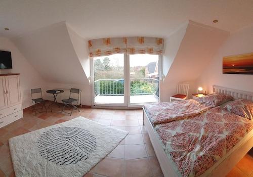 Elternschlafzimmer mit Balkon