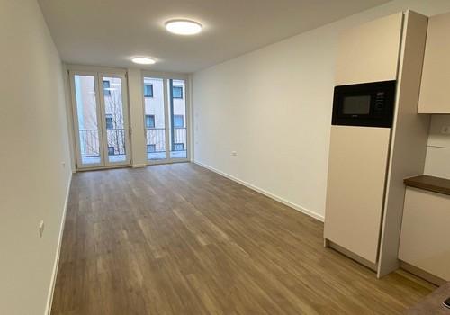 Wohnzimmer mit Balkon