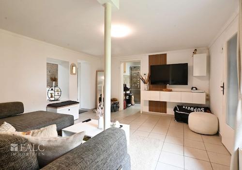 Wohnzimmer mit Zugang Esszimmer und Küche WE3 