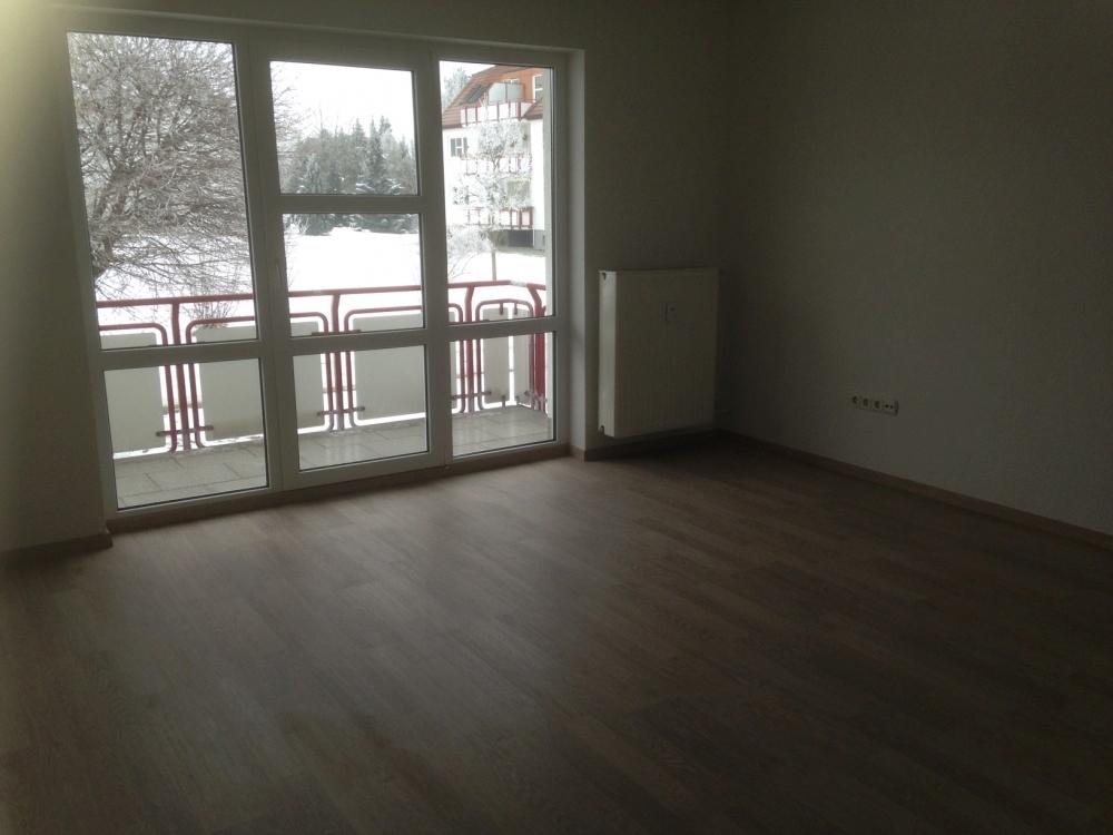 Wohnzimmer mit Balkon