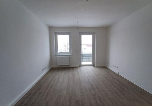 Wohnzimmer mit Balkon