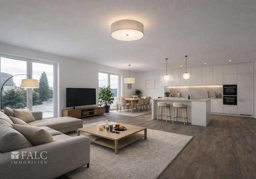 „Offener Wohn- und Küchenbereich mit großzügigem Raumgefühl, Möblierung visualisiert.“