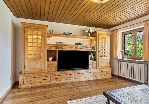 Wohnzimmer mit Zugang zum Gart