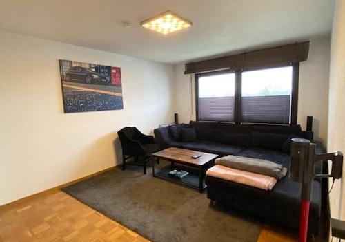 Wohnzimmer mit Couch+Parkette