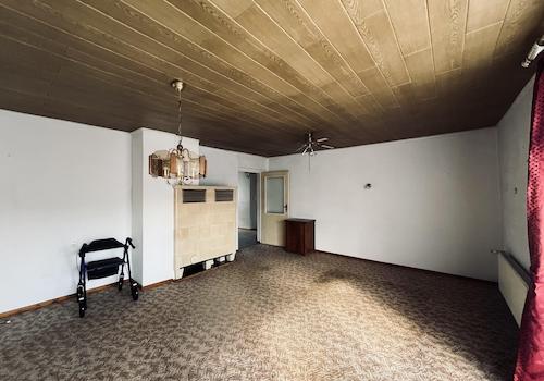 Wohnzimmer EG mit Kachelofen