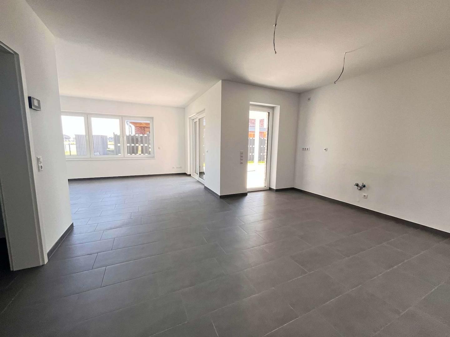 Wohnzimmer mit Küche