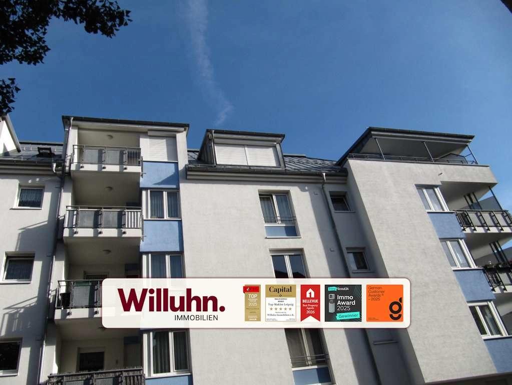 Hausansicht mit Balkonen
