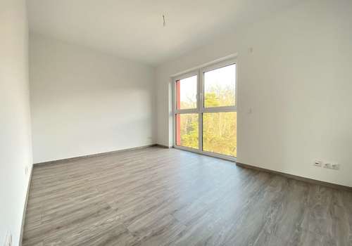 Schlafzimmer mit Blick ins Grün