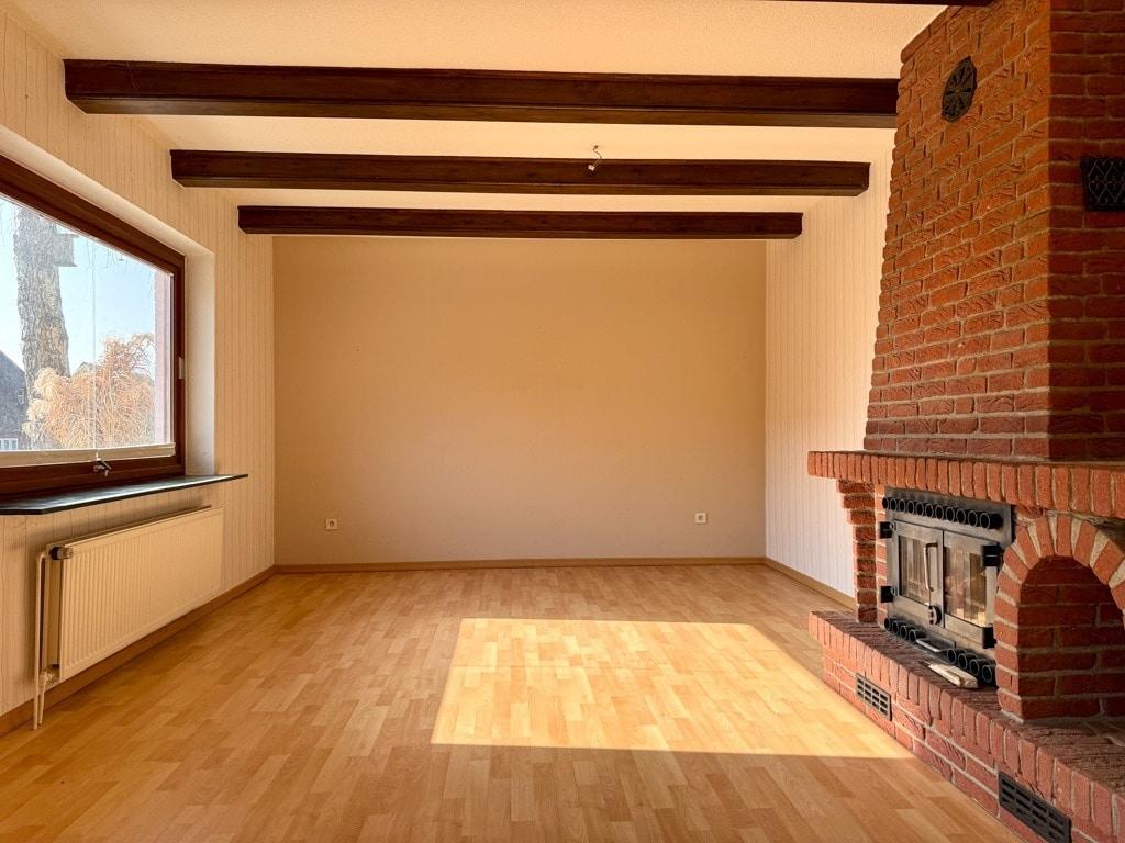 Wohnzimmer mit Kamin