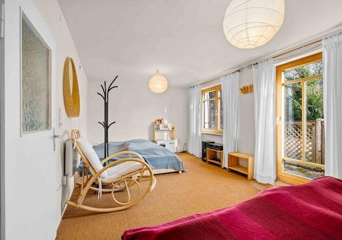 Schlafzimmer mit Balkon