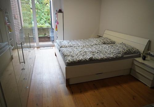 Schlafzimmer mit Balkon