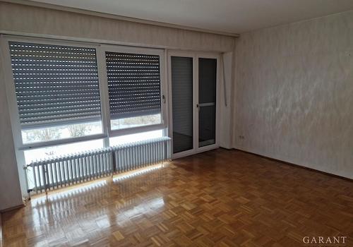 Wohnzimmer ELW mit Zugang zur Terrasse