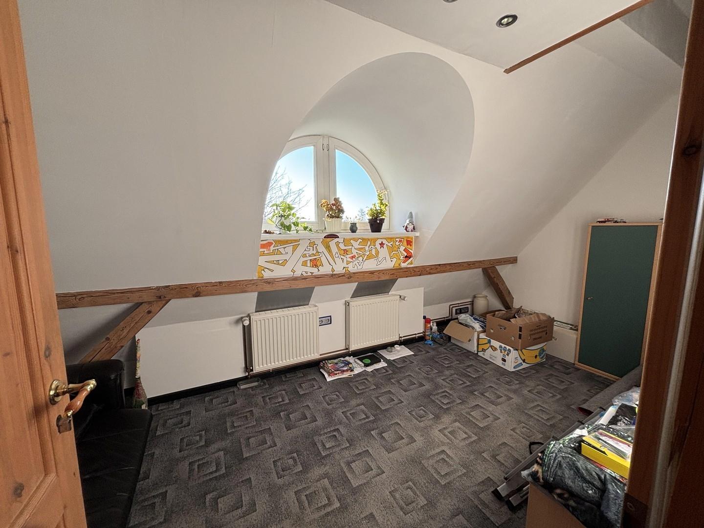Zimmer im Spitzboden