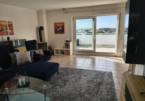 Wohnzimmer mit Dachterrasse