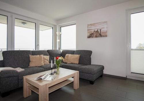 Wohnzimmer mit L-Sofa