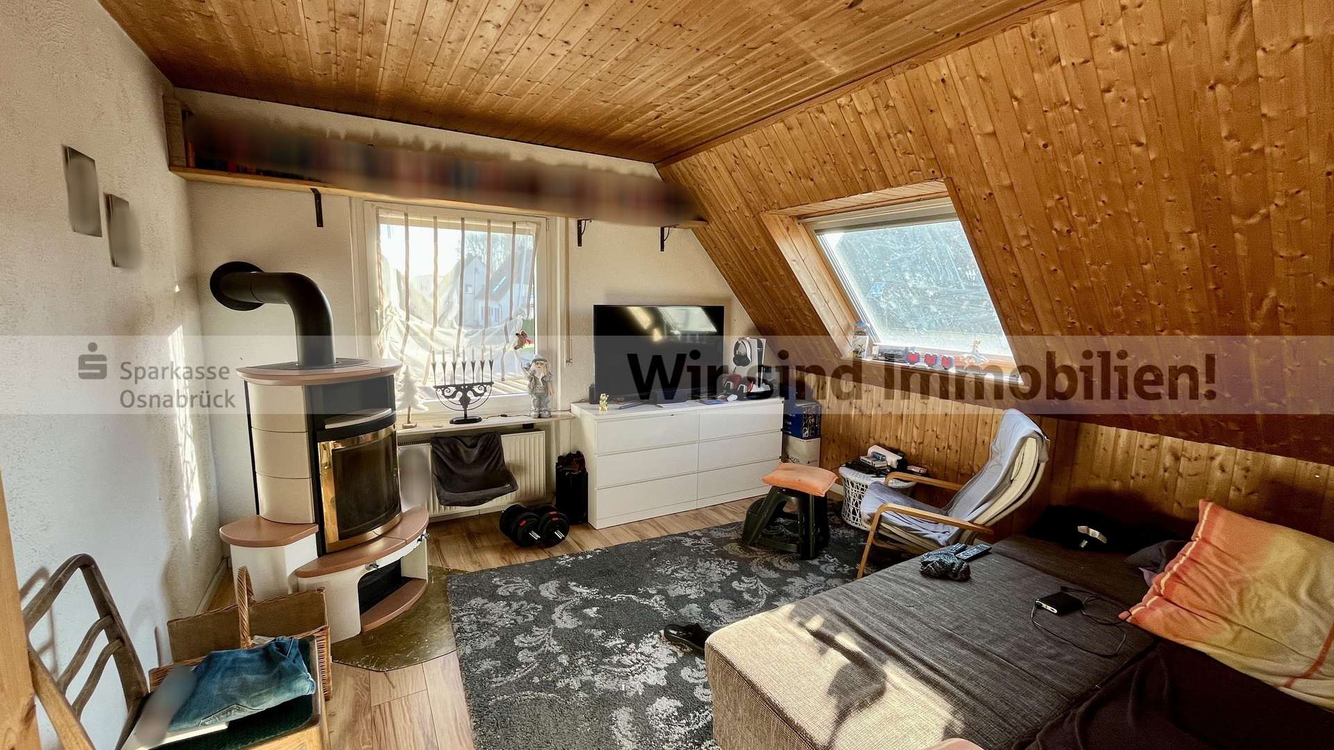 Wohnzimmer mit Ofen DG