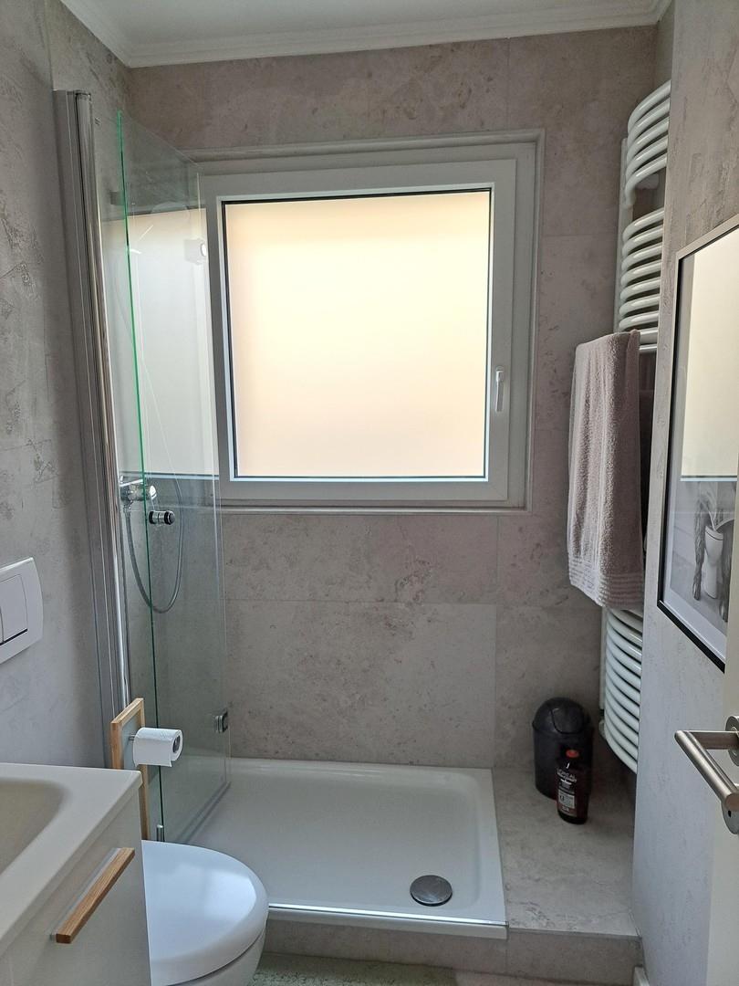 Bad mit Drehfalttür