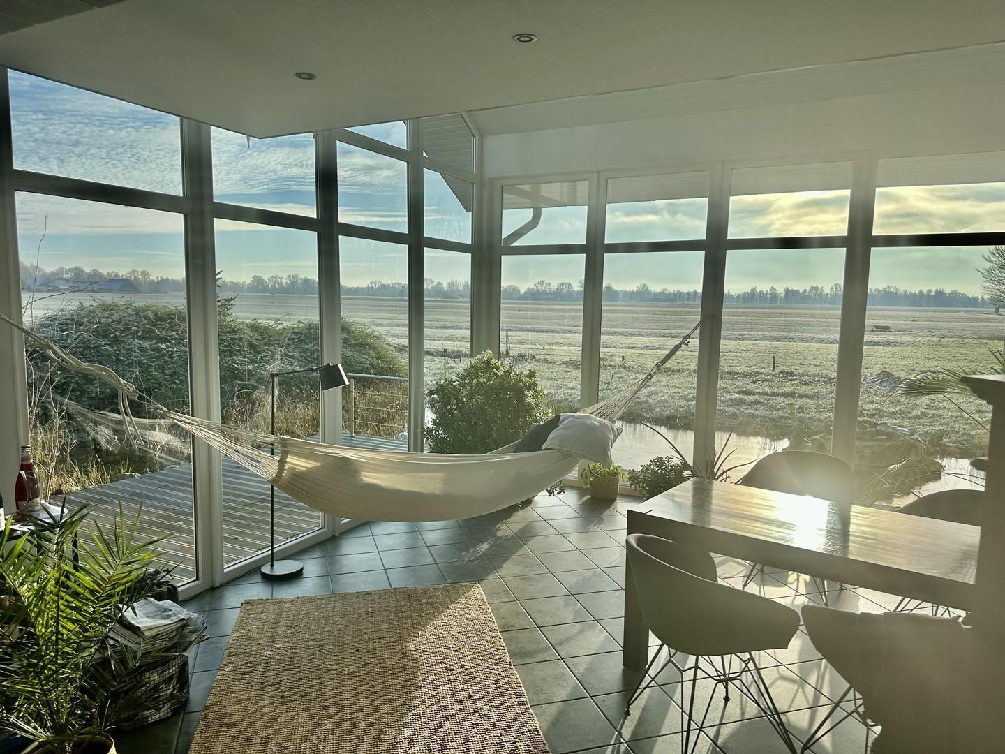 Wintergarten mit Hängemattenv.