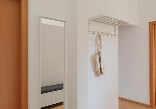 Garderobe hinter der spanischen Wand