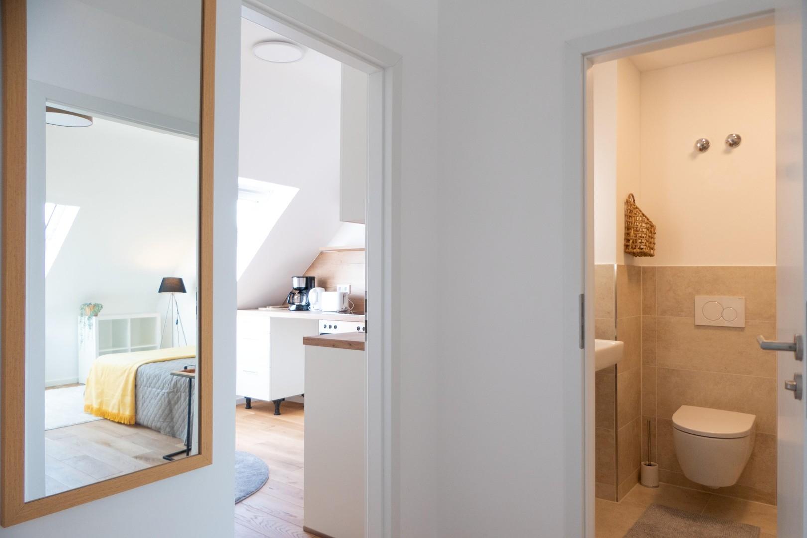 Küche, Bad und Schlafzimmer