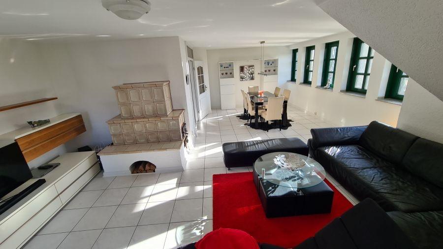 Kachelofen Ferienwohnung Wohnzimmer OG