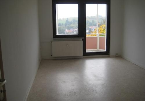 Wohnzimmer mit Balkon