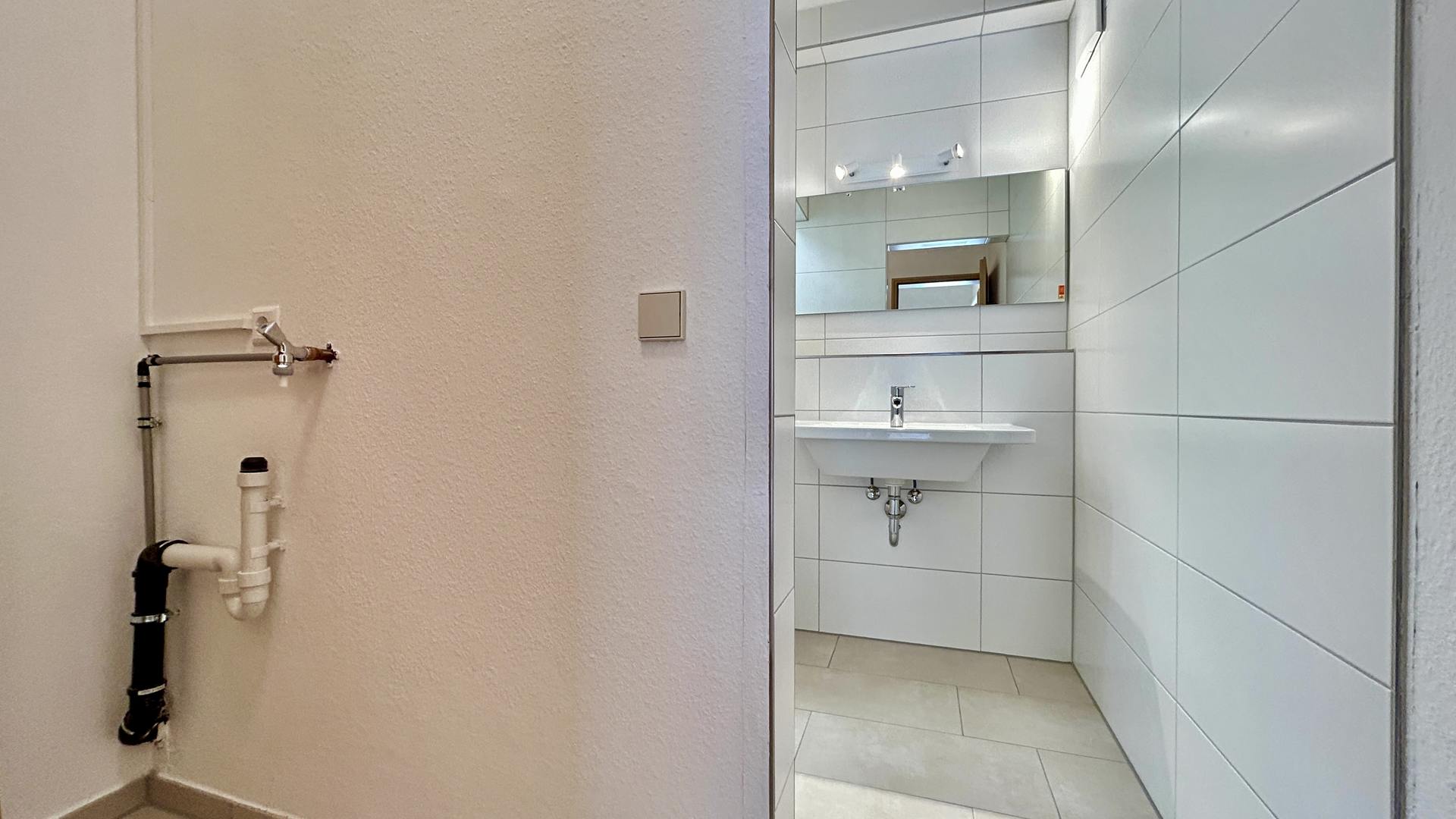 Badezimmer mit Waschmaschinenanschluss