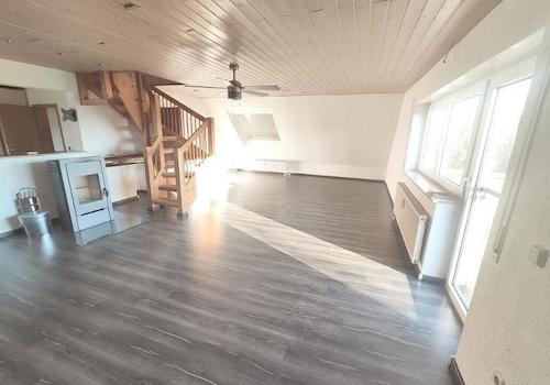 Whg. 1: Essbereich und Wohnzimmer Bild 2