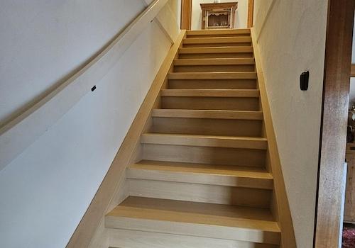 Treppe in den 1. Stock